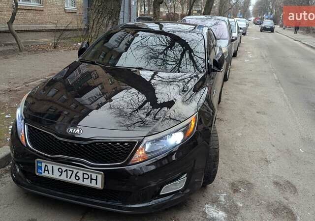 Черный Киа Оптима, объемом двигателя 2.36 л и пробегом 190 тыс. км за 11000 $, фото 1 на Automoto.ua