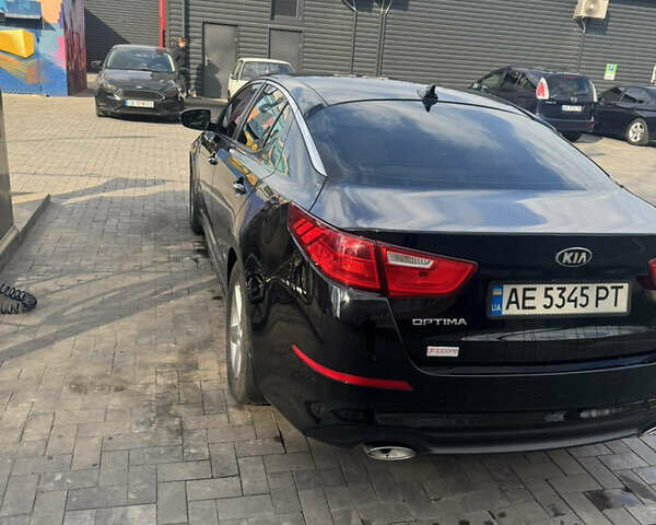 Черный Киа Оптима, объемом двигателя 2.36 л и пробегом 119 тыс. км за 10200 $, фото 1 на Automoto.ua