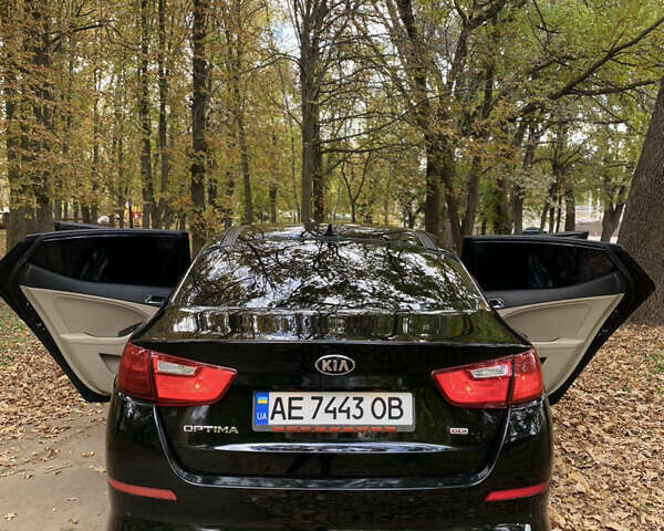 Чорний Кіа Оптіма, об'ємом двигуна 2.4 л та пробігом 208 тис. км за 9300 $, фото 1 на Automoto.ua