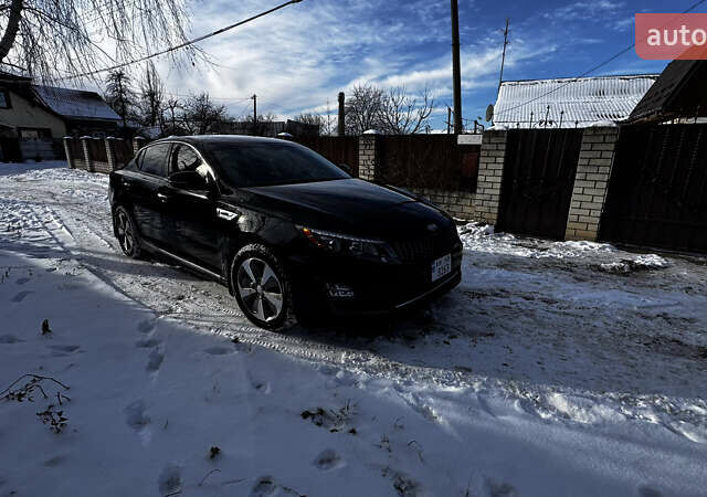 Черный Киа Оптима, объемом двигателя 2.36 л и пробегом 240 тыс. км за 11500 $, фото 1 на Automoto.ua