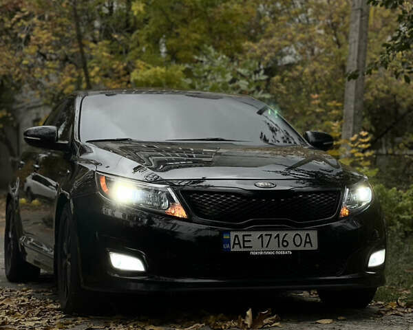 Черный Киа Оптима, объемом двигателя 2.36 л и пробегом 145 тыс. км за 10000 $, фото 1 на Automoto.ua