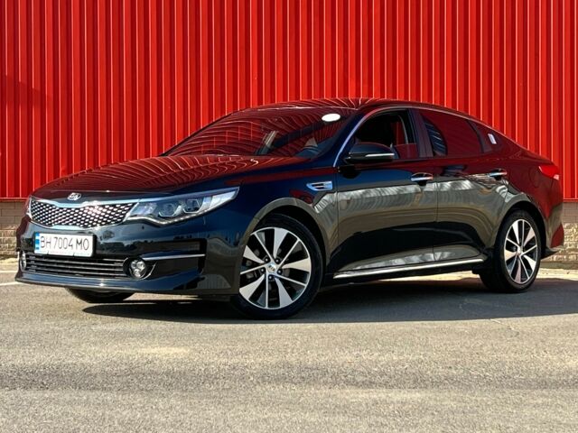 Черный Киа Оптима, объемом двигателя 2 л и пробегом 70 тыс. км за 13200 $, фото 1 на Automoto.ua