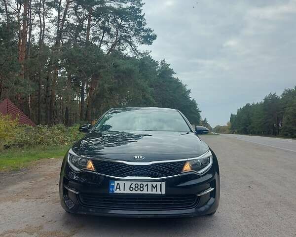 Черный Киа Оптима, объемом двигателя 2.36 л и пробегом 122 тыс. км за 10200 $, фото 1 на Automoto.ua