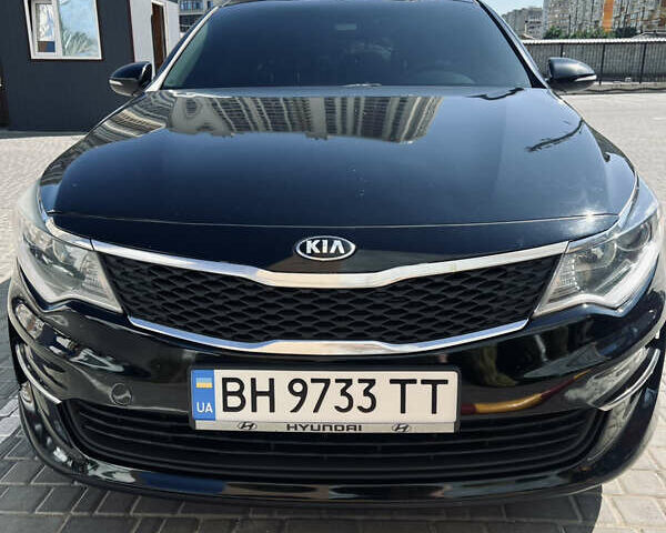 Черный Киа Оптима, объемом двигателя 2.4 л и пробегом 144 тыс. км за 10300 $, фото 1 на Automoto.ua