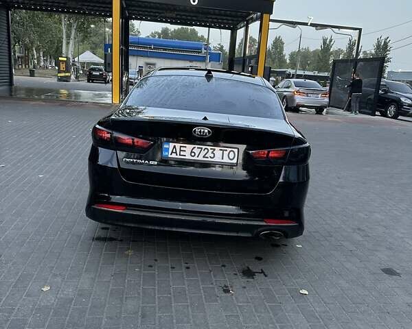 Чорний Кіа Оптіма, об'ємом двигуна 2.36 л та пробігом 205 тис. км за 9000 $, фото 1 на Automoto.ua