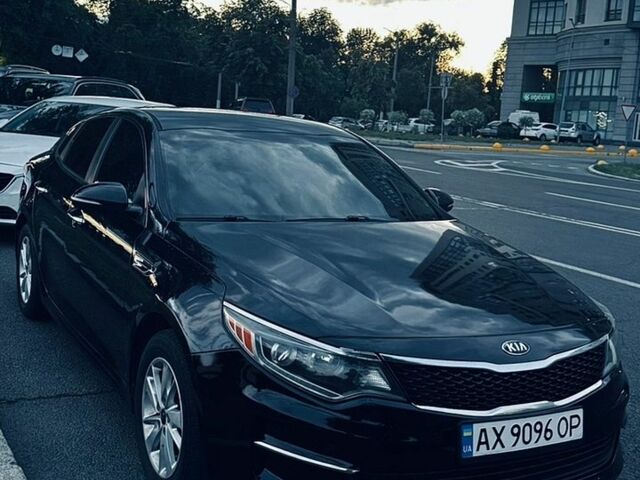 Черный Киа Оптима, объемом двигателя 2.36 л и пробегом 209 тыс. км за 11200 $, фото 1 на Automoto.ua