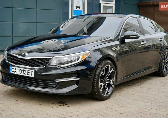 Черный Киа Оптима, объемом двигателя 2.36 л и пробегом 142 тыс. км за 10200 $, фото 1 на Automoto.ua