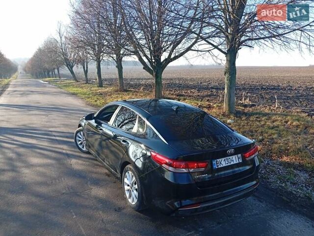 Черный Киа Оптима, объемом двигателя 2.36 л и пробегом 262 тыс. км за 9600 $, фото 1 на Automoto.ua