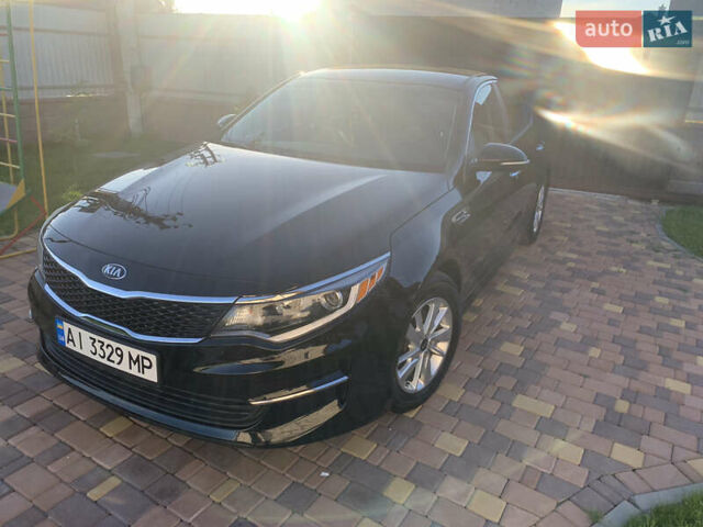Черный Киа Оптима, объемом двигателя 2.36 л и пробегом 80 тыс. км за 11000 $, фото 1 на Automoto.ua