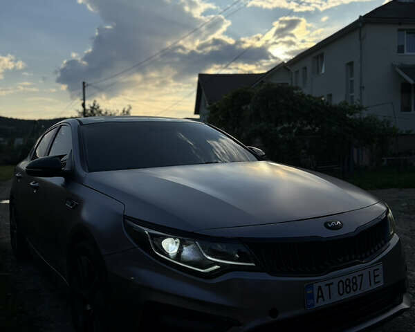 Чорний Кіа Оптіма, об'ємом двигуна 2 л та пробігом 116 тис. км за 14999 $, фото 1 на Automoto.ua