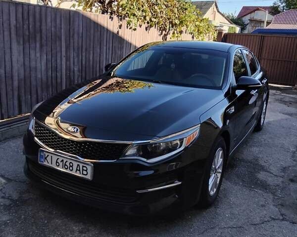 Черный Киа Оптима, объемом двигателя 2.4 л и пробегом 113 тыс. км за 11700 $, фото 1 на Automoto.ua