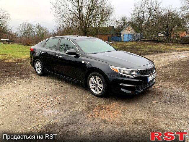 Чорний Кіа Оптіма, об'ємом двигуна 2.4 л та пробігом 132 тис. км за 11800 $, фото 1 на Automoto.ua