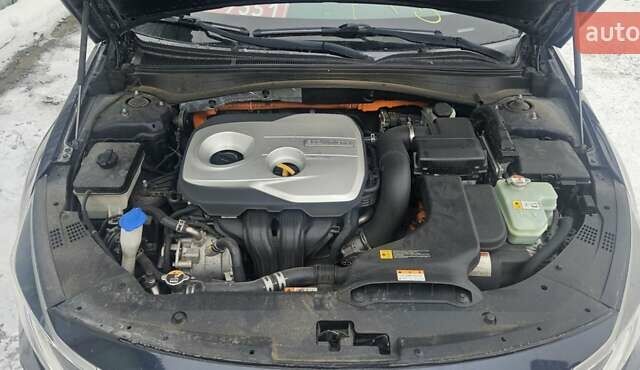 Черный Киа Оптима, объемом двигателя 2 л и пробегом 235 тыс. км за 10800 $, фото 1 на Automoto.ua