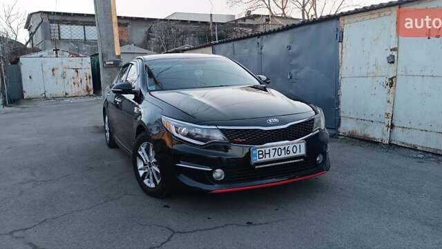 Черный Киа Оптима, объемом двигателя 2.36 л и пробегом 135 тыс. км за 13300 $, фото 1 на Automoto.ua