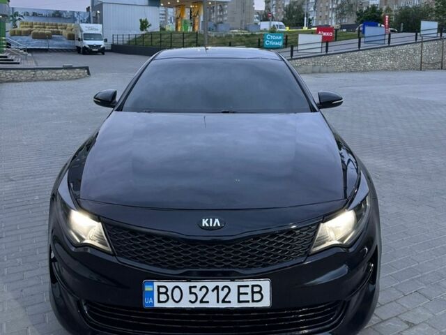Черный Киа Оптима, объемом двигателя 2.36 л и пробегом 116 тыс. км за 11800 $, фото 1 на Automoto.ua