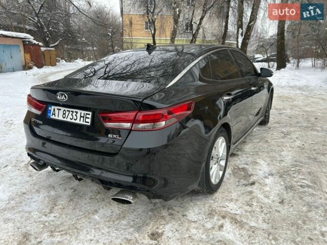 Чорний Кіа Оптіма, об'ємом двигуна 2 л та пробігом 70 тис. км за 17900 $, фото 1 на Automoto.ua