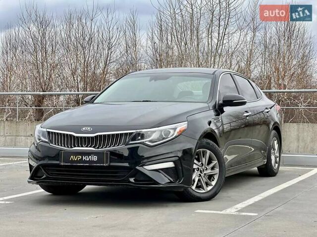 Черный Киа Оптима, объемом двигателя 2.36 л и пробегом 235 тыс. км за 11500 $, фото 1 на Automoto.ua