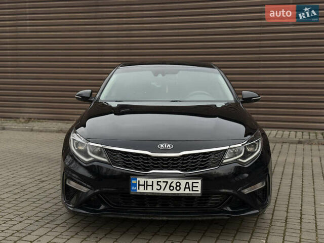 Черный Киа Оптима, объемом двигателя 2.36 л и пробегом 129 тыс. км за 9950 $, фото 1 на Automoto.ua