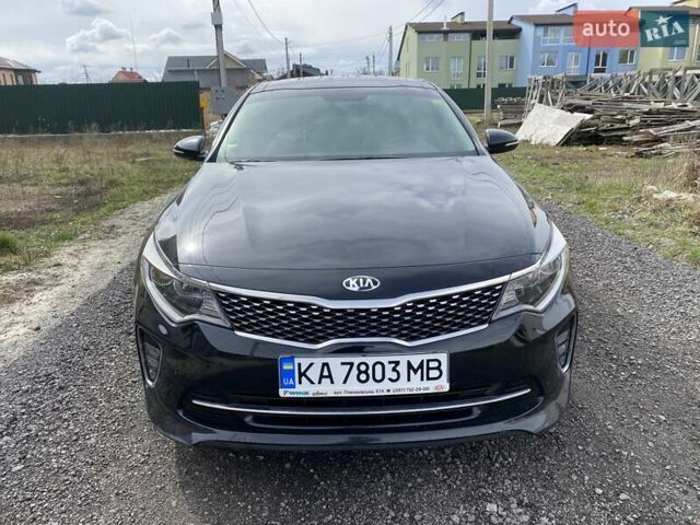 Черный Киа Оптима, объемом двигателя 2.36 л и пробегом 133 тыс. км за 12800 $, фото 1 на Automoto.ua