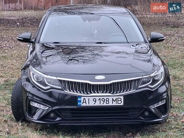 Черный Киа Оптима, объемом двигателя 2.36 л и пробегом 134 тыс. км за 14300 $, фото 1 на Automoto.ua