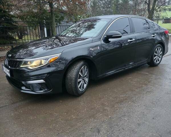 Черный Киа Оптима, объемом двигателя 2.36 л и пробегом 55 тыс. км за 14500 $, фото 1 на Automoto.ua