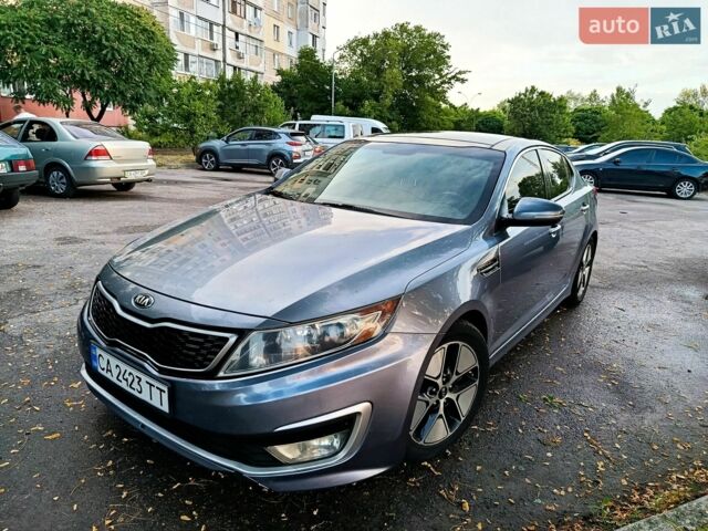 Фіолетовий Кіа Оптіма, об'ємом двигуна 2.36 л та пробігом 228 тис. км за 9899 $, фото 1 на Automoto.ua