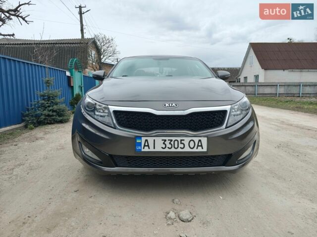 Коричневий Кіа Оптіма, об'ємом двигуна 2.4 л та пробігом 189 тис. км за 8900 $, фото 1 на Automoto.ua