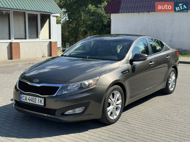 Коричневий Кіа Оптіма, об'ємом двигуна 2.4 л та пробігом 181 тис. км за 8000 $, фото 1 на Automoto.ua