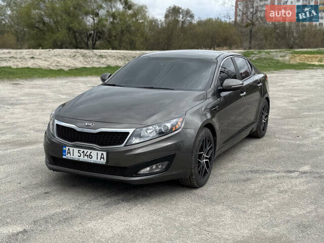 Коричневий Кіа Оптіма, об'ємом двигуна 2.4 л та пробігом 248 тис. км за 8500 $, фото 1 на Automoto.ua