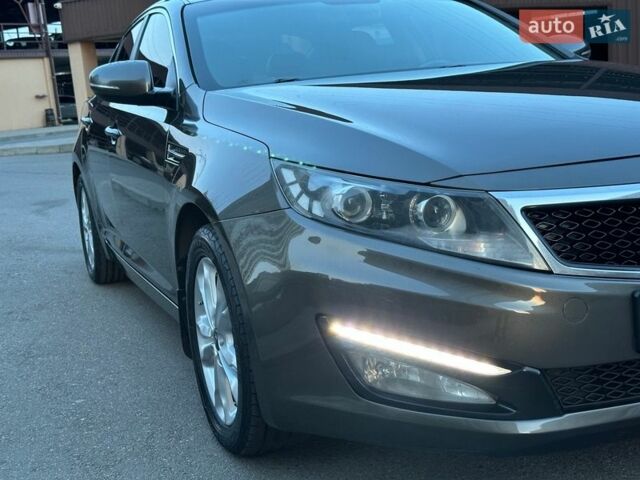 Коричневий Кіа Оптіма, об'ємом двигуна 2 л та пробігом 121 тис. км за 11400 $, фото 1 на Automoto.ua