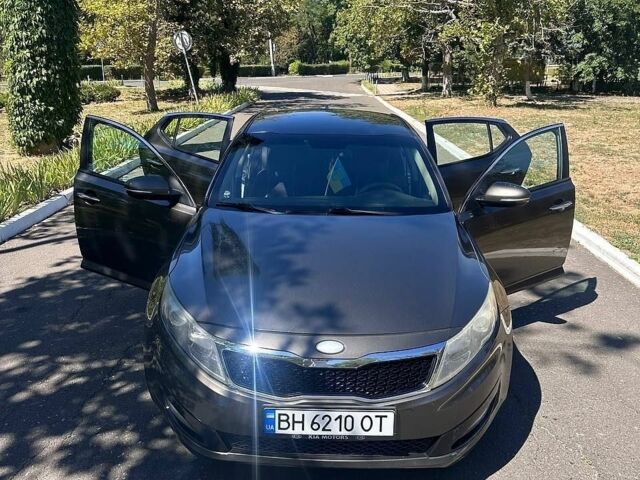 Коричневий Кіа Оптіма, об'ємом двигуна 2.4 л та пробігом 206 тис. км за 8500 $, фото 1 на Automoto.ua