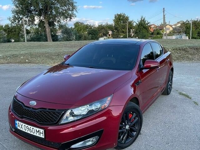 Червоний Кіа Оптіма, об'ємом двигуна 2 л та пробігом 252 тис. км за 8500 $, фото 1 на Automoto.ua