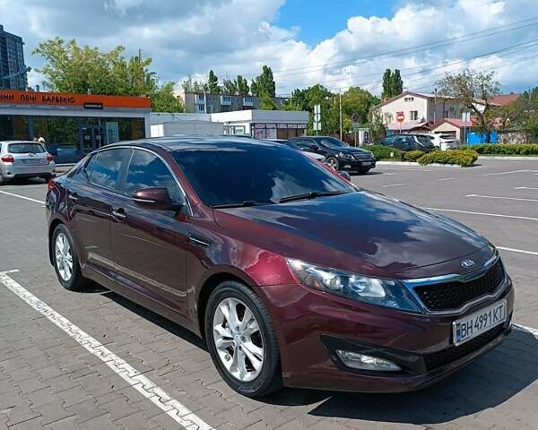 Красный Киа Оптима, объемом двигателя 2.36 л и пробегом 160 тыс. км за 10500 $, фото 1 на Automoto.ua