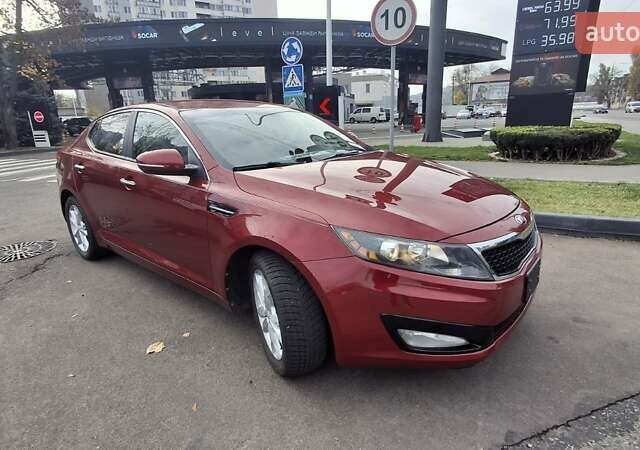 Червоний Кіа Оптіма, об'ємом двигуна 2.36 л та пробігом 145 тис. км за 9200 $, фото 1 на Automoto.ua