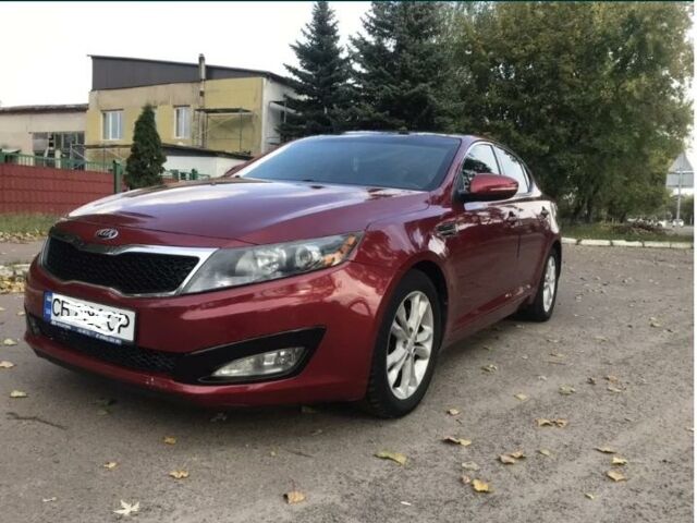 Красный Киа Оптима, объемом двигателя 2.4 л и пробегом 260 тыс. км за 8900 $, фото 1 на Automoto.ua