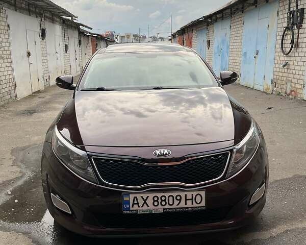 Красный Киа Оптима, объемом двигателя 2.36 л и пробегом 142 тыс. км за 10800 $, фото 1 на Automoto.ua