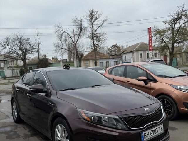 Красный Киа Оптима, объемом двигателя 2.4 л и пробегом 116 тыс. км за 9000 $, фото 1 на Automoto.ua