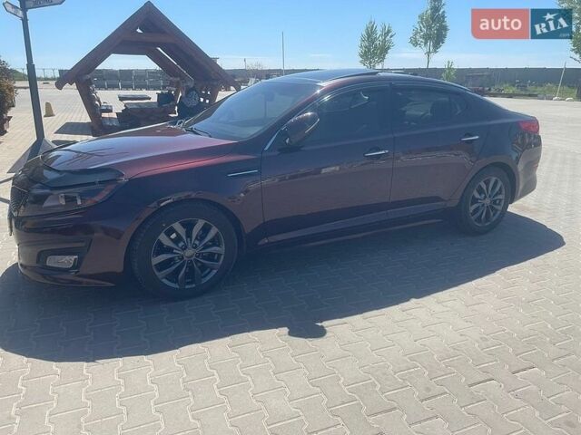 Красный Киа Оптима, объемом двигателя 2.4 л и пробегом 241 тыс. км за 9200 $, фото 1 на Automoto.ua