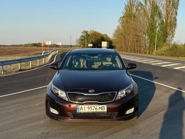 Красный Киа Оптима, объемом двигателя 2.4 л и пробегом 144 тыс. км за 9500 $, фото 1 на Automoto.ua
