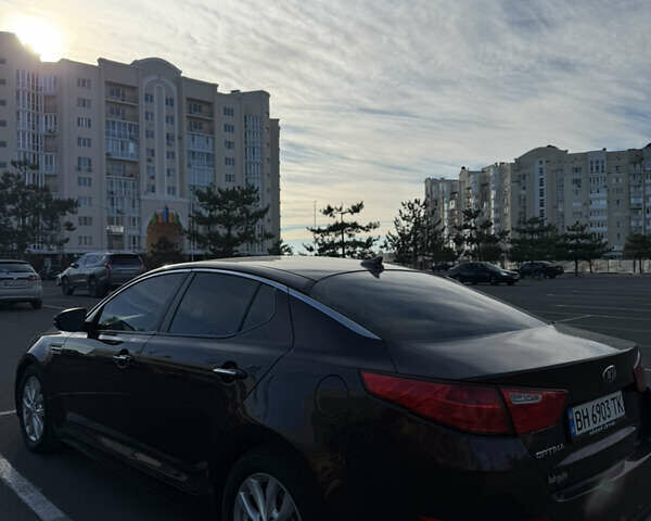 Красный Киа Оптима, объемом двигателя 2.36 л и пробегом 177 тыс. км за 8700 $, фото 1 на Automoto.ua