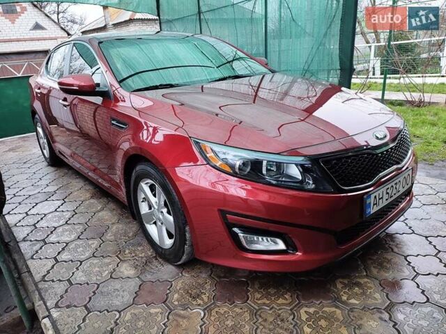 Красный Киа Оптима, объемом двигателя 2.36 л и пробегом 112 тыс. км за 10300 $, фото 1 на Automoto.ua