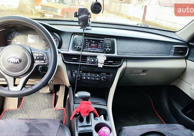 Червоний Кіа Оптіма, об'ємом двигуна 2.4 л та пробігом 150 тис. км за 9500 $, фото 1 на Automoto.ua