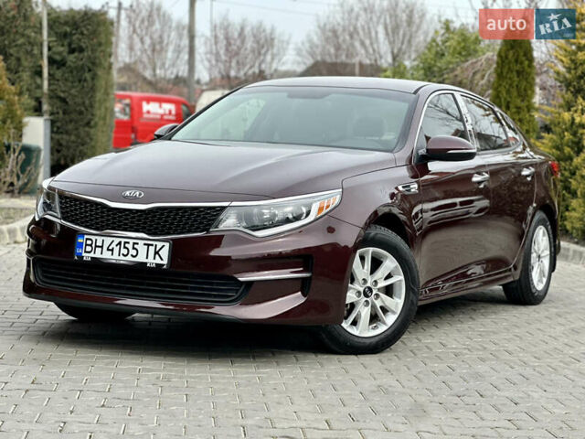 Красный Киа Оптима, объемом двигателя 2.36 л и пробегом 210 тыс. км за 11200 $, фото 1 на Automoto.ua