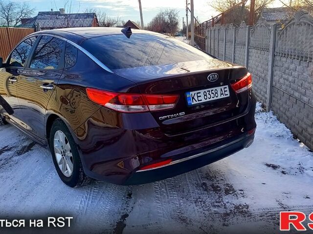 Червоний Кіа Оптіма, об'ємом двигуна 2.4 л та пробігом 120 тис. км за 11000 $, фото 1 на Automoto.ua