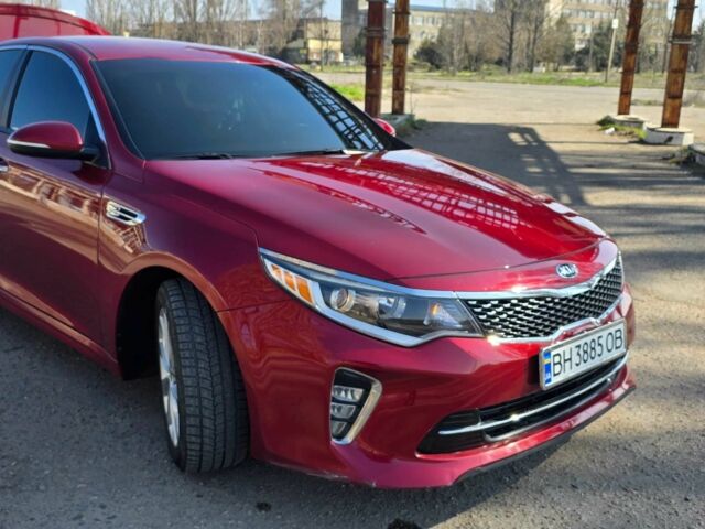 Красный Киа Оптима, объемом двигателя 2.4 л и пробегом 95 тыс. км за 13300 $, фото 1 на Automoto.ua