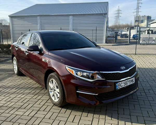 Красный Киа Оптима, объемом двигателя 2.36 л и пробегом 91 тыс. км за 10999 $, фото 1 на Automoto.ua