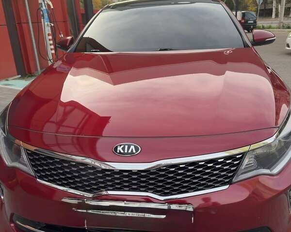 Красный Киа Оптима, объемом двигателя 2.36 л и пробегом 140 тыс. км за 13500 $, фото 1 на Automoto.ua