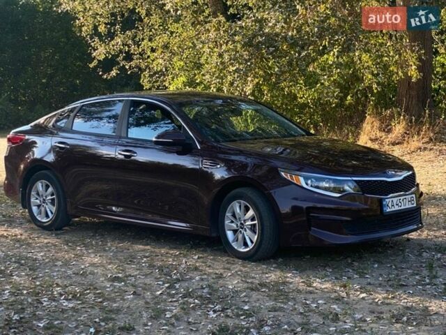 Красный Киа Оптима, объемом двигателя 2.4 л и пробегом 223 тыс. км за 10200 $, фото 1 на Automoto.ua