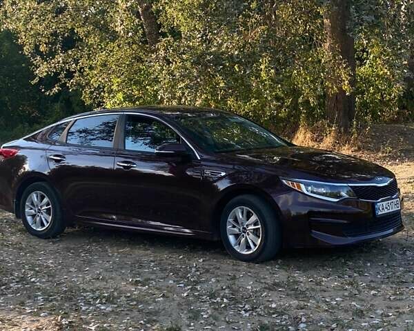 Красный Киа Оптима, объемом двигателя 2.4 л и пробегом 222 тыс. км за 11500 $, фото 1 на Automoto.ua