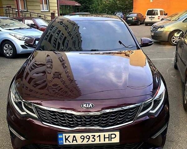 Красный Киа Оптима, объемом двигателя 2.4 л и пробегом 116 тыс. км за 12900 $, фото 1 на Automoto.ua